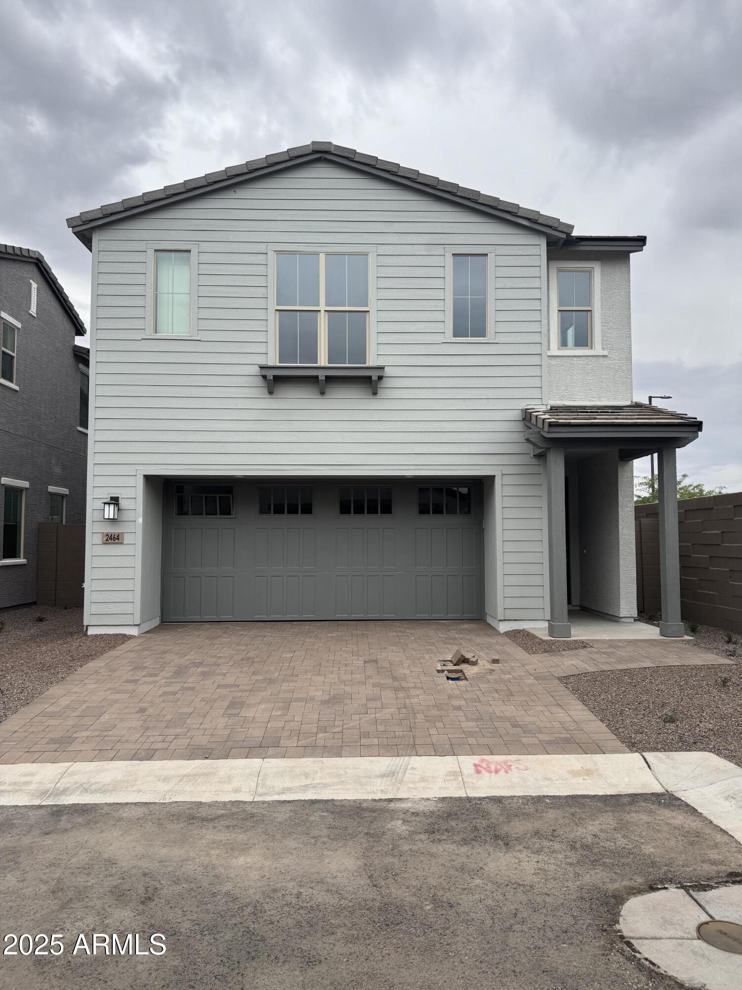 2464 West Rowel Road Phoenix, AZ 85085 - Photo 1 of 12 a front view of a house with yard