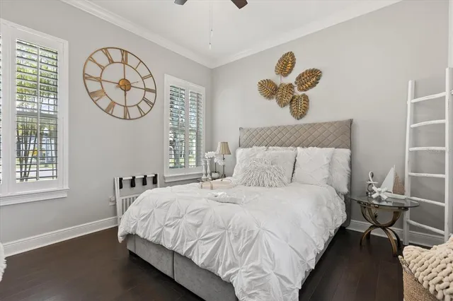 a bedroom with bed and a window