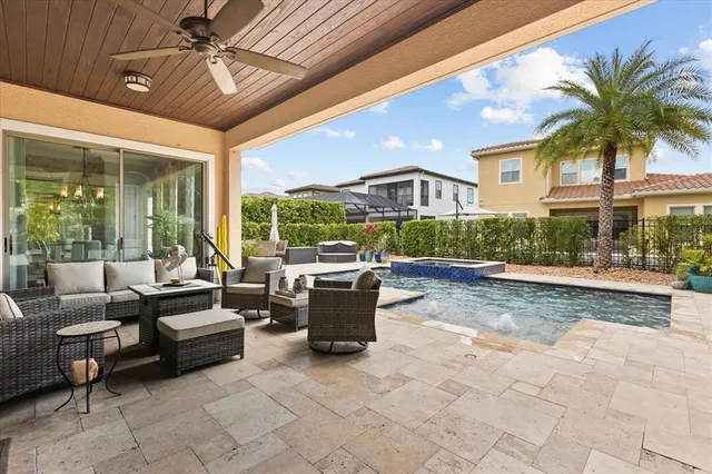 a view of a patio with couches and chairs