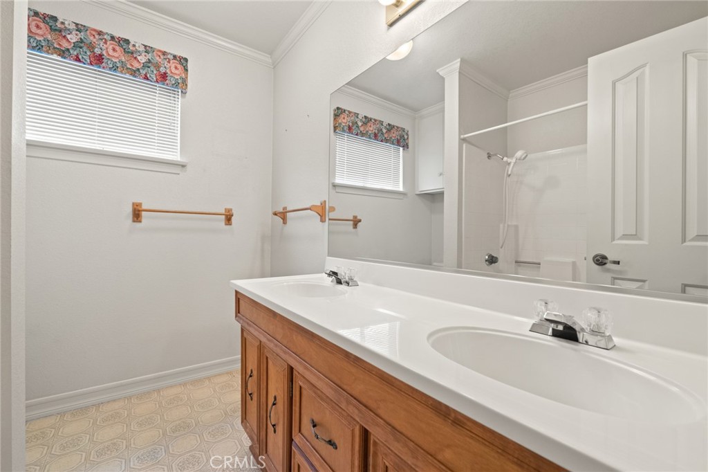 57622 Sierra Way Yucca Valley, CA 92284 - Photo 20 of 55 a bathroom with a sink and a mirror