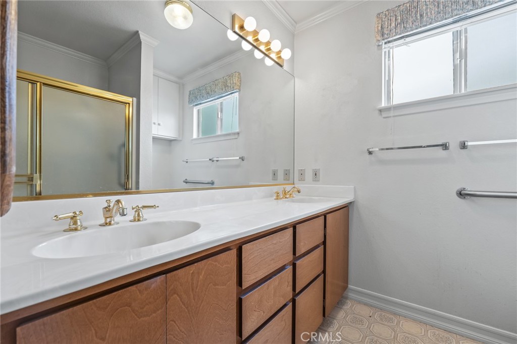 57622 Sierra Way Yucca Valley, CA 92284 - Photo 24 of 55 a bathroom with a sink and a mirror