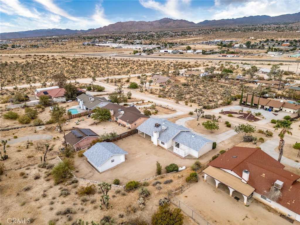 57622 Sierra Way Yucca Valley, CA 92284 - Photo 45 of 55 an aerial view of residential building with outdoor space