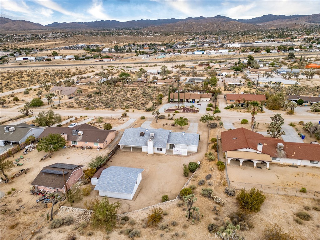 57622 Sierra Way Yucca Valley, CA 92284 - Photo 46 of 55 an aerial view of residential building and lake view