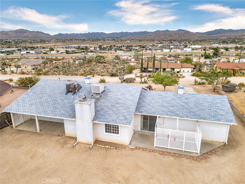 57622 Sierra Way Yucca Valley, CA 92284 - Photo 53 of 55 an aerial view of a house with a yard