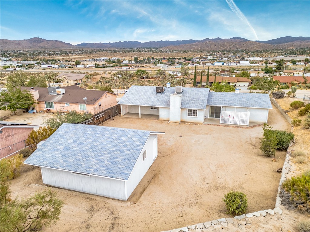 57622 Sierra Way Yucca Valley, CA 92284 - Photo 54 of 55 an aerial view of residential houses with outdoor space