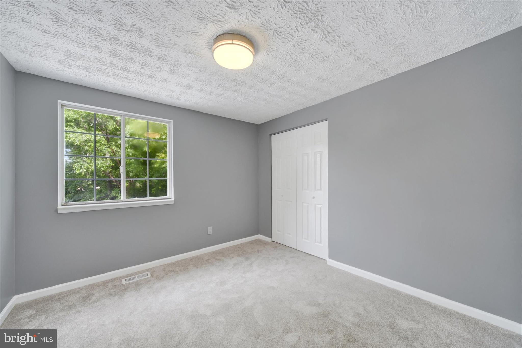 220 Sandhill Road Baltimore, MD 21221 - Photo 11 of 30 a view of a livingroom with a window