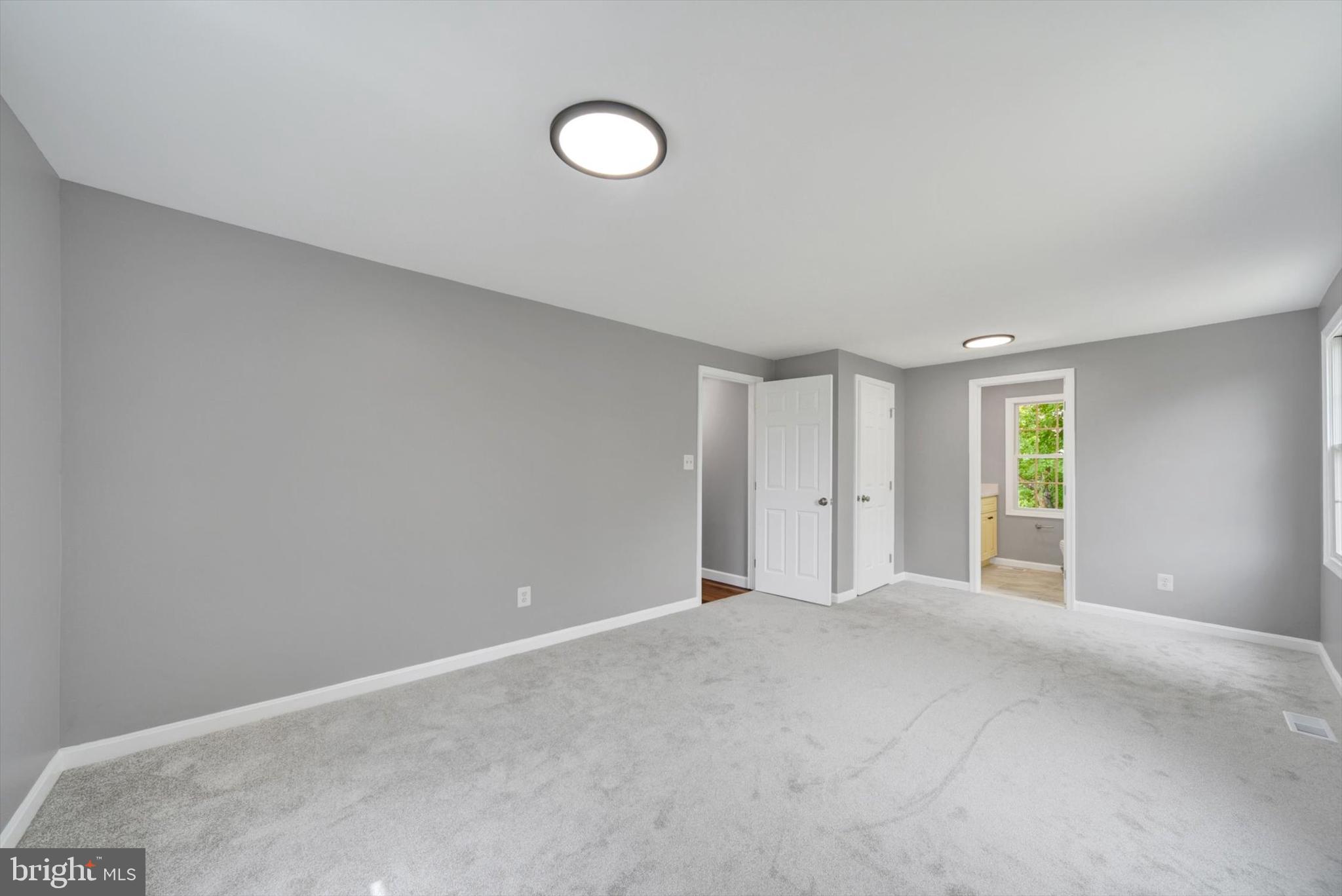 220 Sandhill Road Baltimore, MD 21221 - Photo 13 of 30 a view of an empty room with a window