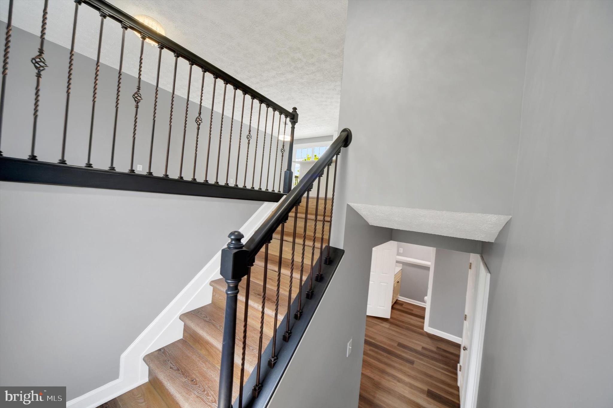 220 Sandhill Road Baltimore, MD 21221 - Photo 15 of 30 a view of staircase with railing and white walls
