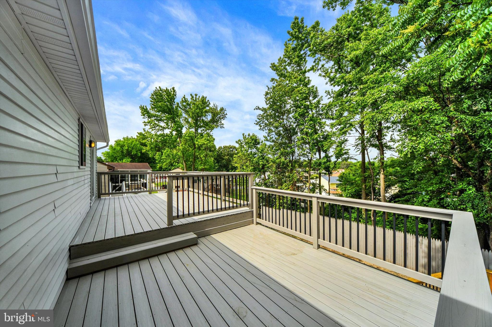 220 Sandhill Road Baltimore, MD 21221 - Photo 25 of 30 a view of balcony with wooden floor