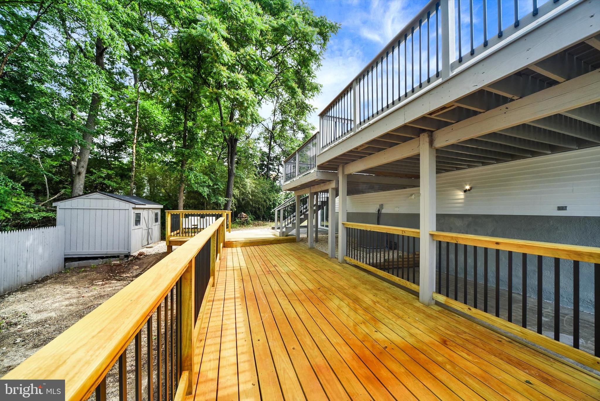 220 Sandhill Road Baltimore, MD 21221 - Photo 26 of 30 a view of balcony with wooden floor and fence