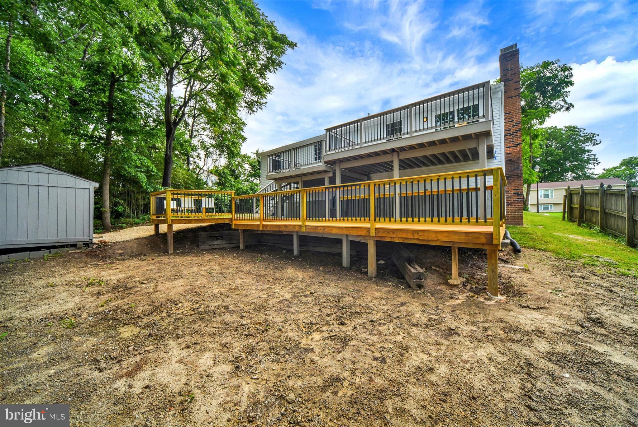 220 Sandhill Road Baltimore, MD 21221 - Photo 30 of 30 a view of a house with a yard and sitting area