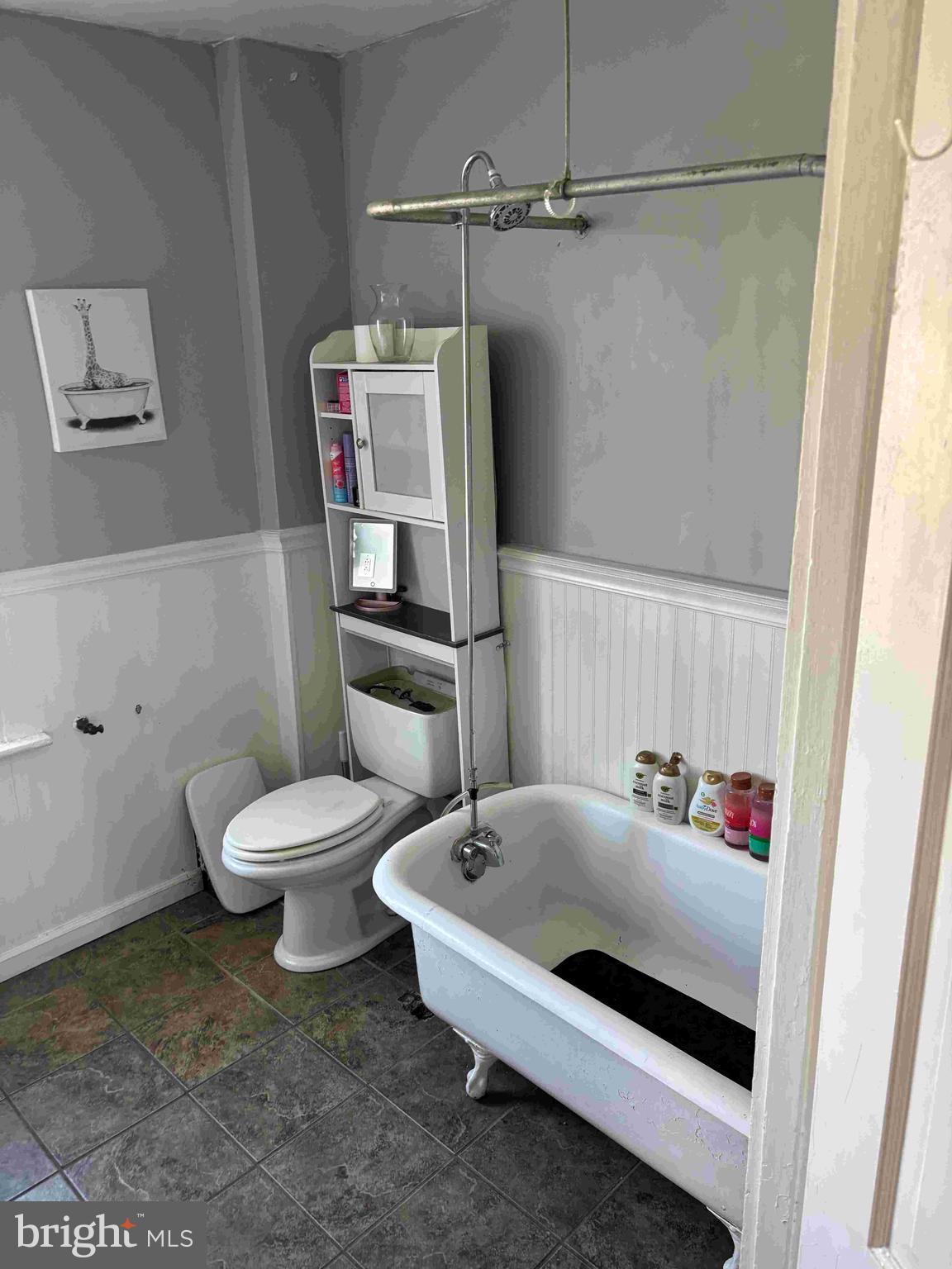 6740 Keystone Street Philadelphia, PA 19135 - Photo 4 of 14 a bathroom with a sink and a toilet
