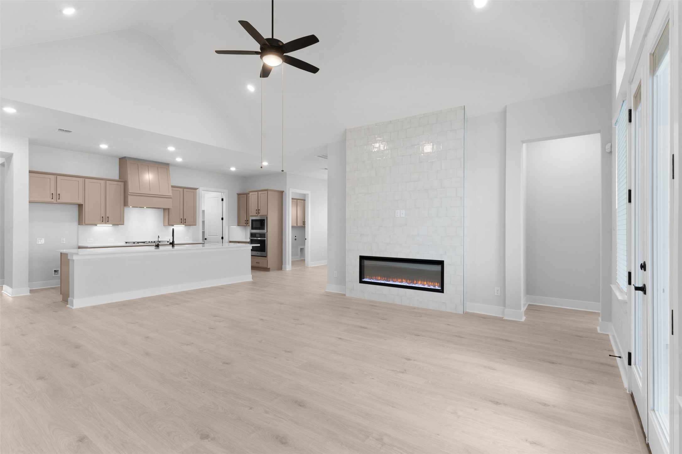 17308 Hope Bergman Road Pflugerville, TX 78660 - Photo 15 of 39 a view of a kitchen with a sink and a refrigerator