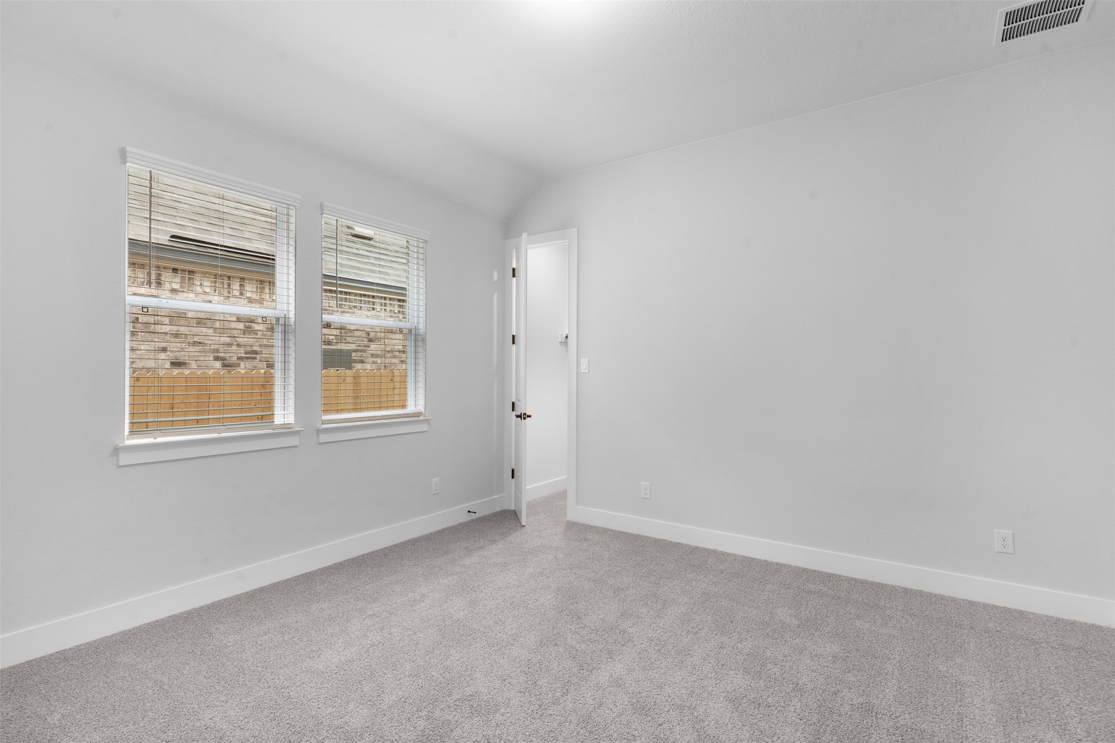 17308 Hope Bergman Road Pflugerville, TX 78660 - Photo 29 of 39 an empty room with windows