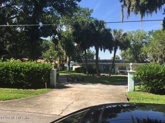 3039 Magnolia Road Orange Park, FL 32065 - Photo 3 of 7 a view of backyard with green space