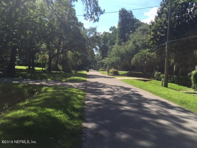 3039 Magnolia Road Orange Park, FL 32065 - Photo 5 of 7 a backyard of a house with lots of green space