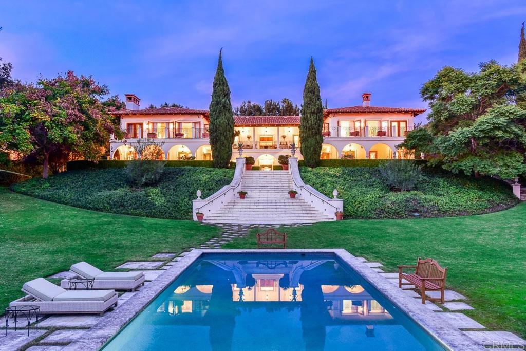 a front view of a house with yard