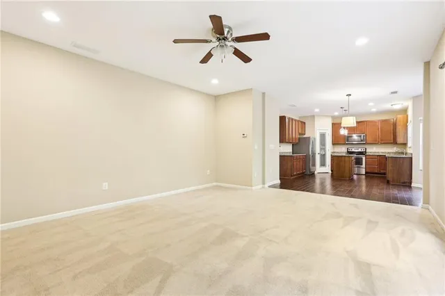 a view of a kitchen with a sink and a kitchen view