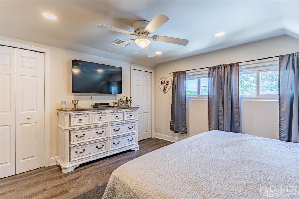 12 Ridge Road Old Bridge, NJ 08857 - Photo 12 of 20 a bedroom with a bed and a flat screen tv