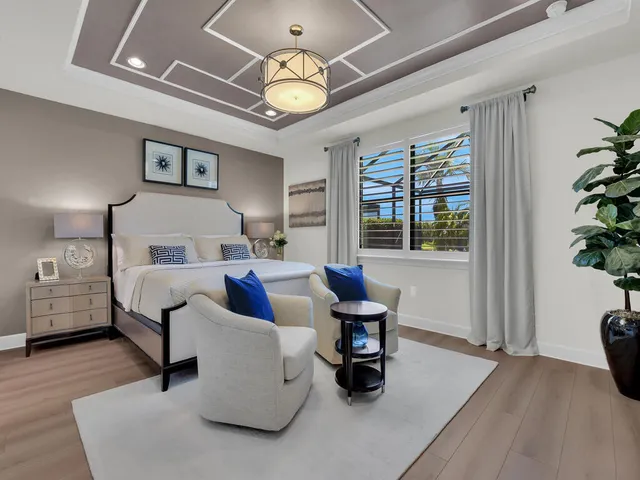 $1,595,000 | 7412 Winding Cypress Drive, Naples, FL 34114