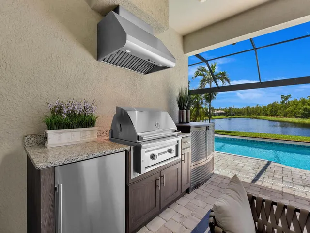 $1,595,000 | 7412 Winding Cypress Drive, Naples, FL 34114