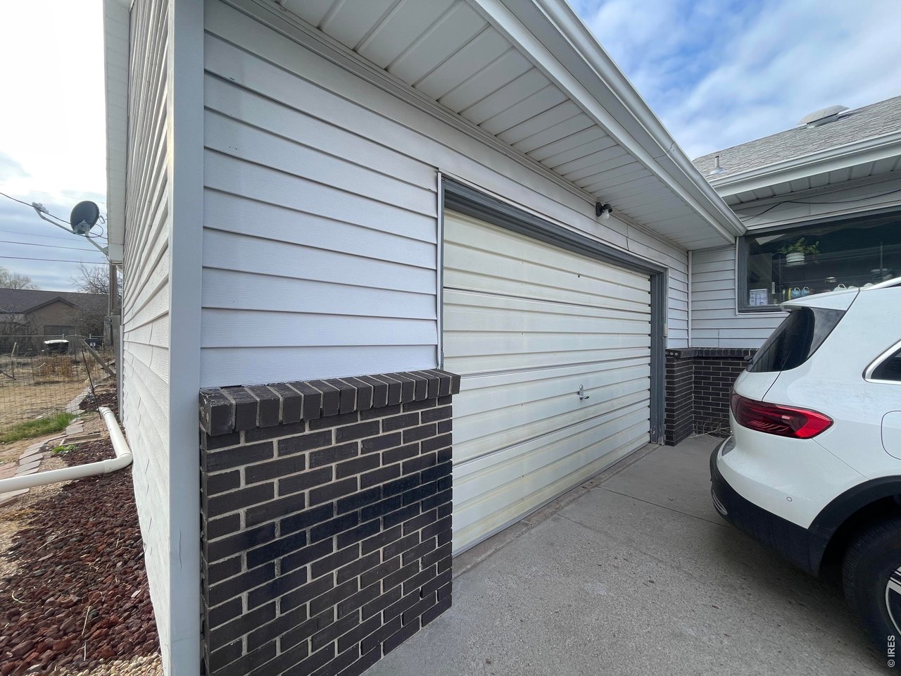 318 Iowa Avenue Stratton, CO 80836 - Photo 14 of 14 a yellow and white house with a outdoor space