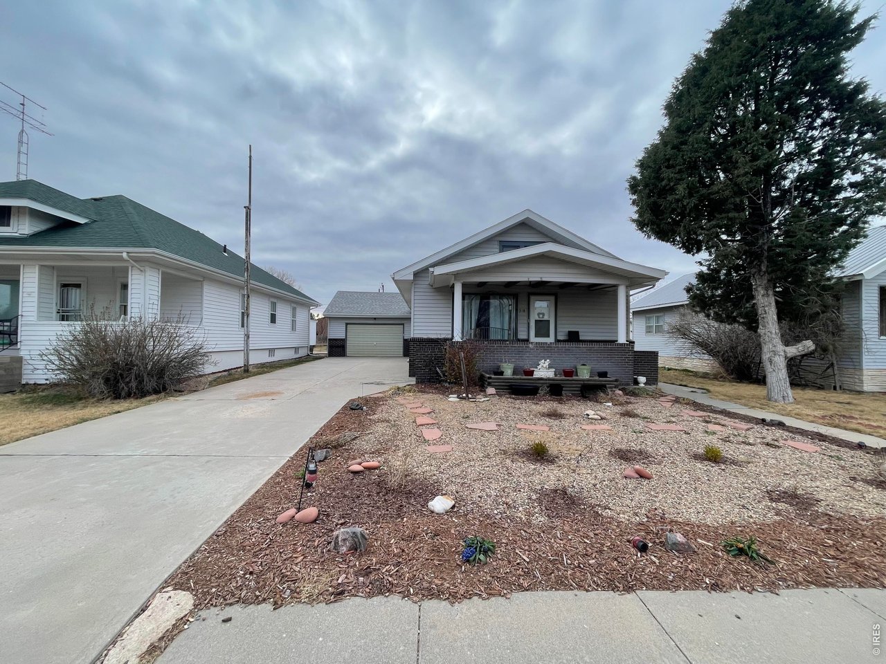 318 Iowa Avenue Stratton, CO 80836 - Photo 3 of 14 a front view of a house with a yard