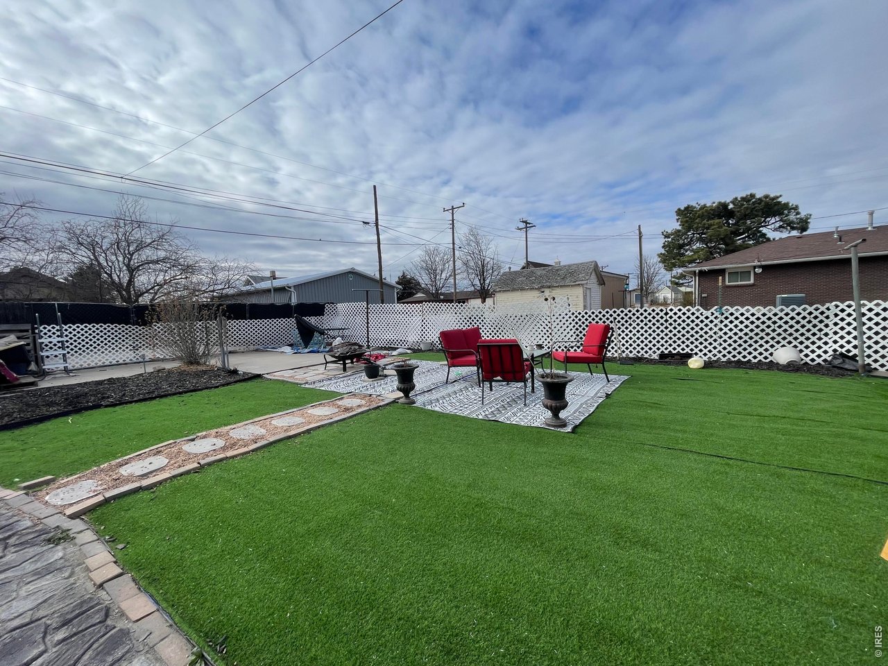 318 Iowa Avenue Stratton, CO 80836 - Photo 5 of 14 a view of a patio with a table and chairs