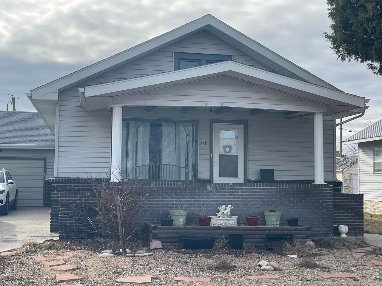 318 Iowa Avenue Stratton, CO 80836 - Photo 9 of 14 a front view of a house with chairs