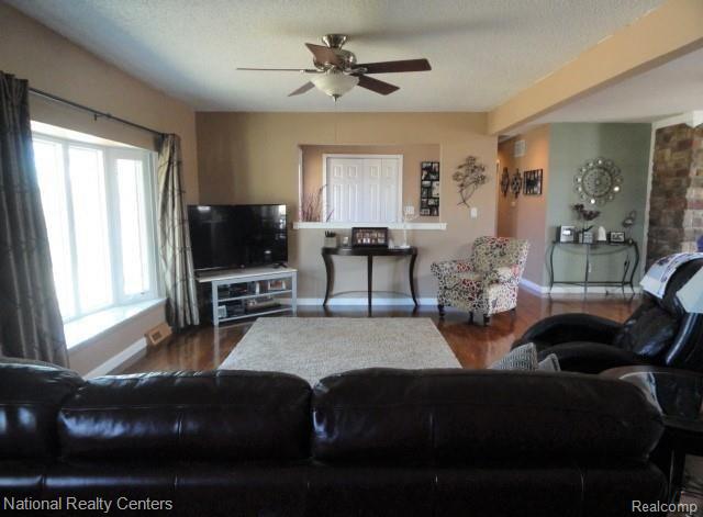 3147 North Tipsico Lake Road Hartland, MI 48353 - Photo 11 of 28 Living Room Open to Dining Room.JPG