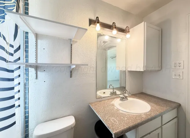 a view of small space with racks on the wall