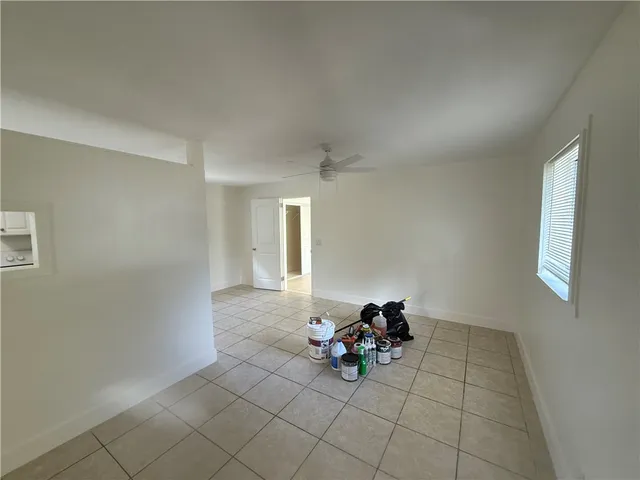 a view of an empty room and window