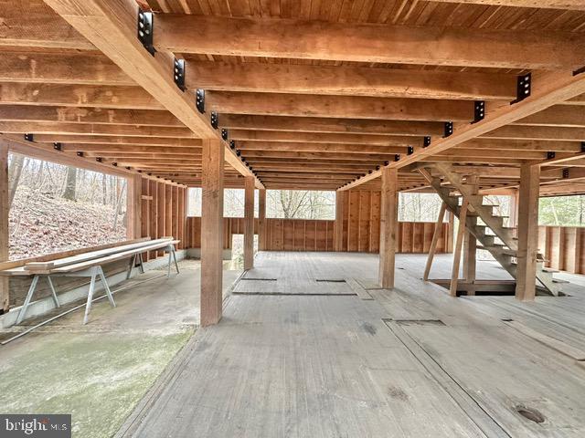 696 Dunkels Church Road Kutztown, PA 19530 - Photo 17 of 39 a view of a patio with table and chairs with wooden floor and fence