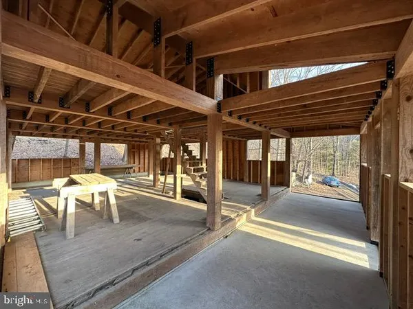a view of an empty room with a large window