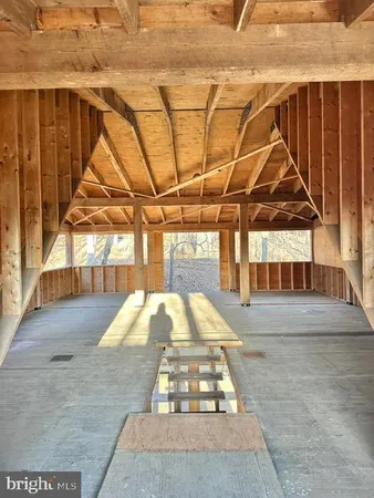 a view of balcony with wooden floor