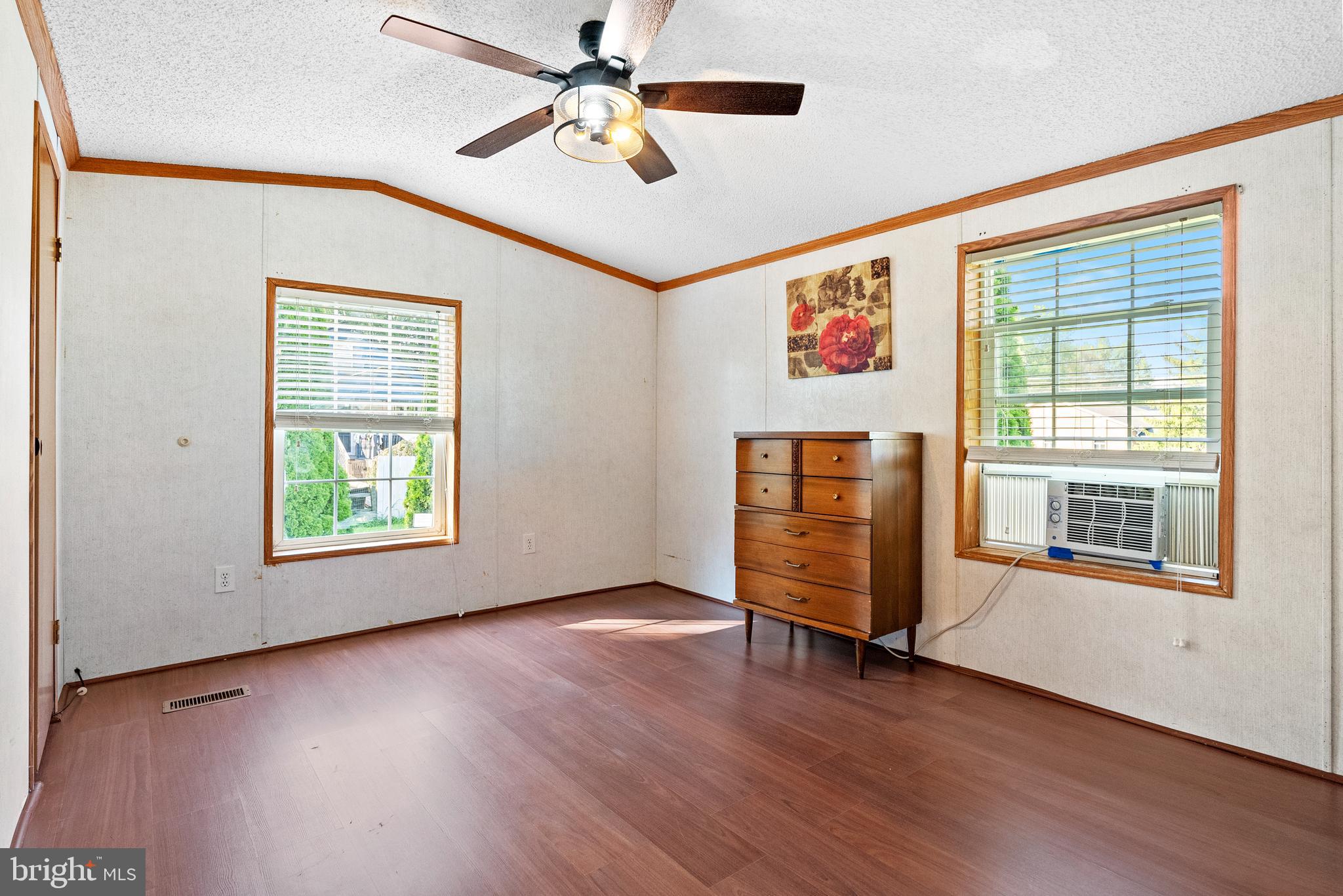 334 Ridge Road Spring City, PA 19475 - Photo 16 of 34 a view of an empty room with wooden floor and a window