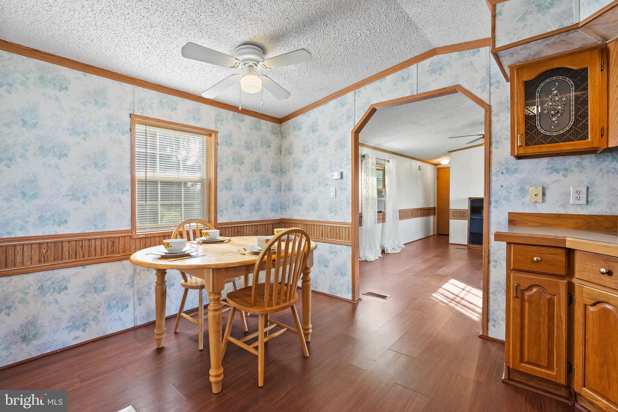 334 Ridge Road Spring City, PA 19475 - Photo 8 of 34 a view of a dining room with furniture window and wooden floor