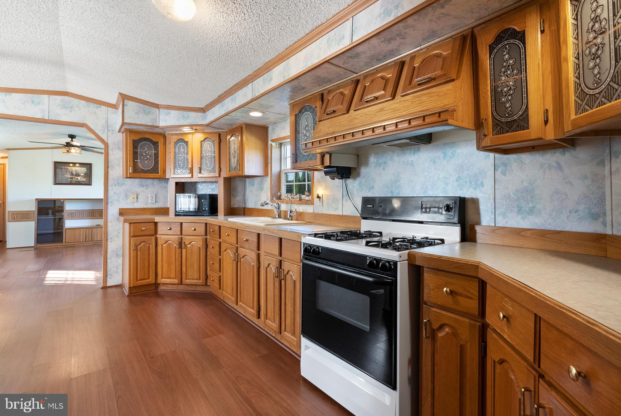 334 Ridge Road Spring City, PA 19475 - Photo 10 of 34 a kitchen with stainless steel appliances granite countertop a stove and a sink