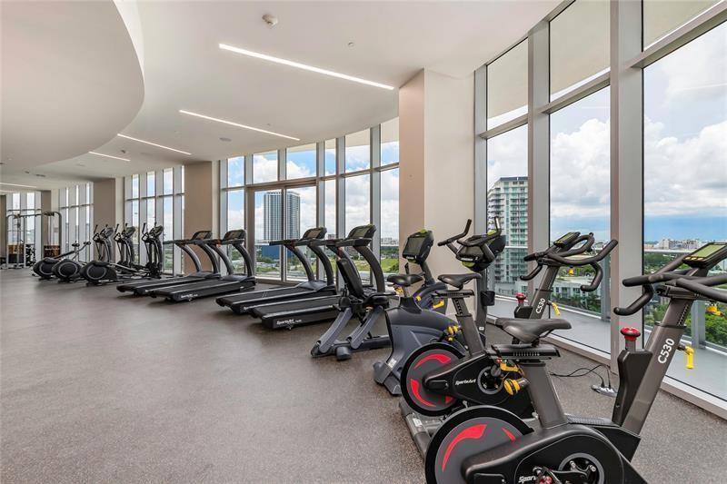 488 Northeast 18th Street, Unit 3503 Miami, FL 33132 - Photo 16 of 16 a view of a room with gym equipment