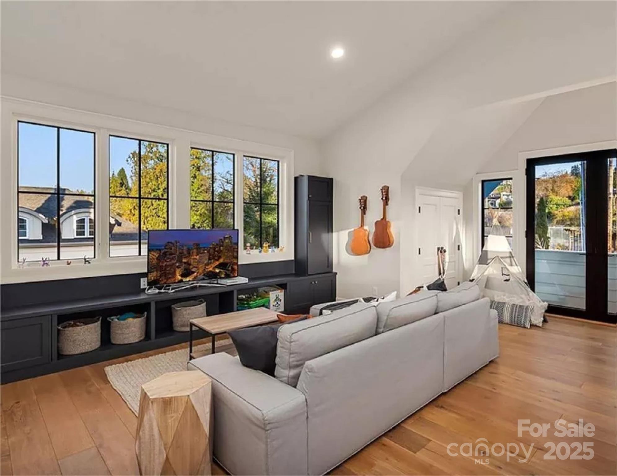 9490 Sherrills Ford Road Terrell, NC 28682 - Photo 14 of 24 a living room with furniture and a flat screen tv