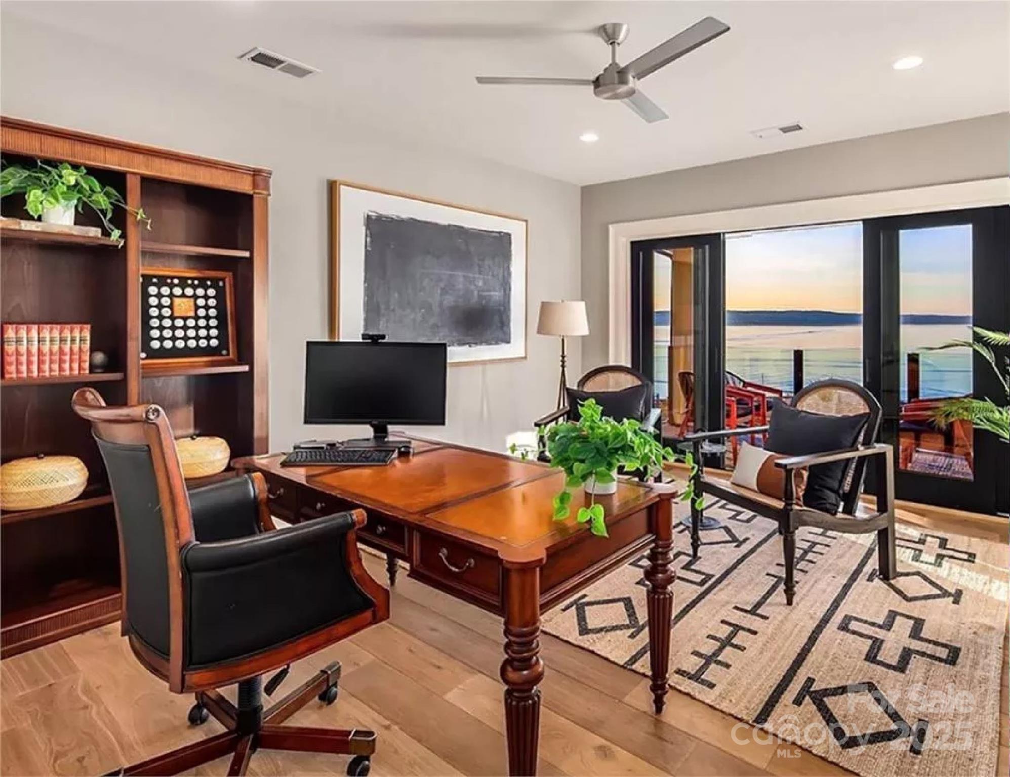 9490 Sherrills Ford Road Terrell, NC 28682 - Photo 18 of 24 a outdoor living space with furniture a flat screen tv and a window