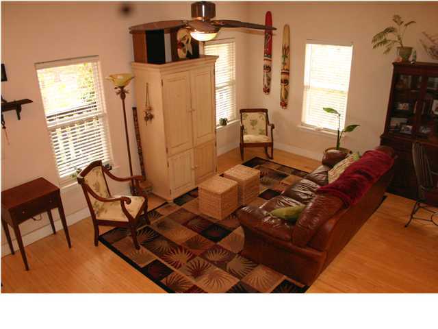 461 Bay Grove Road Freeport, FL 32439 - Photo 2 of 18 a living room with furniture a flat screen tv and a window