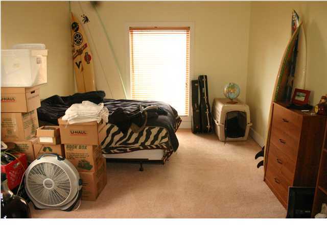 461 Bay Grove Road Freeport, FL 32439 - Photo 15 of 18 a bedroom with a bed and a view of bathroom
