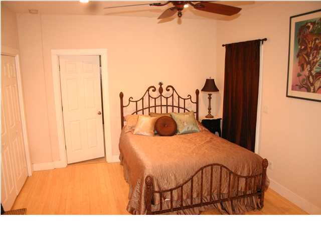 461 Bay Grove Road Freeport, FL 32439 - Photo 5 of 18 a bedroom with a bed and a table