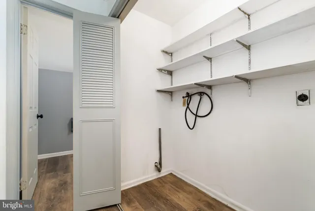 a view of small space with racks on the wall