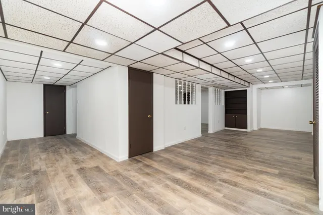 a view of a hallway with a window