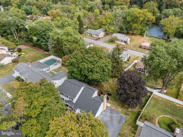 an aerial view of residential house with outdoor space