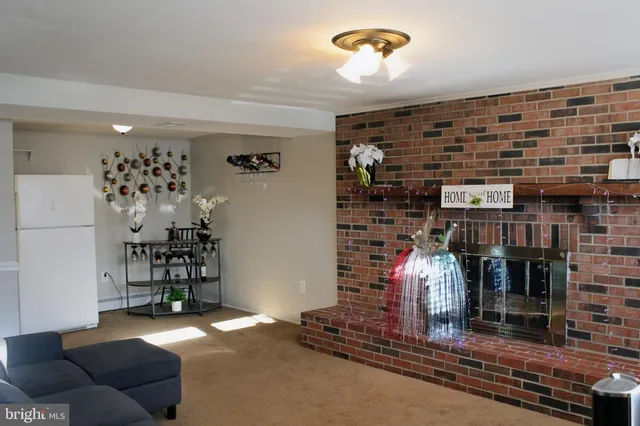 a living room with fireplace