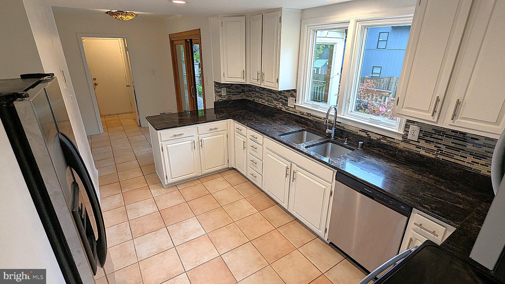 1835 Batten Hollow Road Vienna, VA 22182 - Photo 10 of 50 Modern kitchen with sleek finishes.
