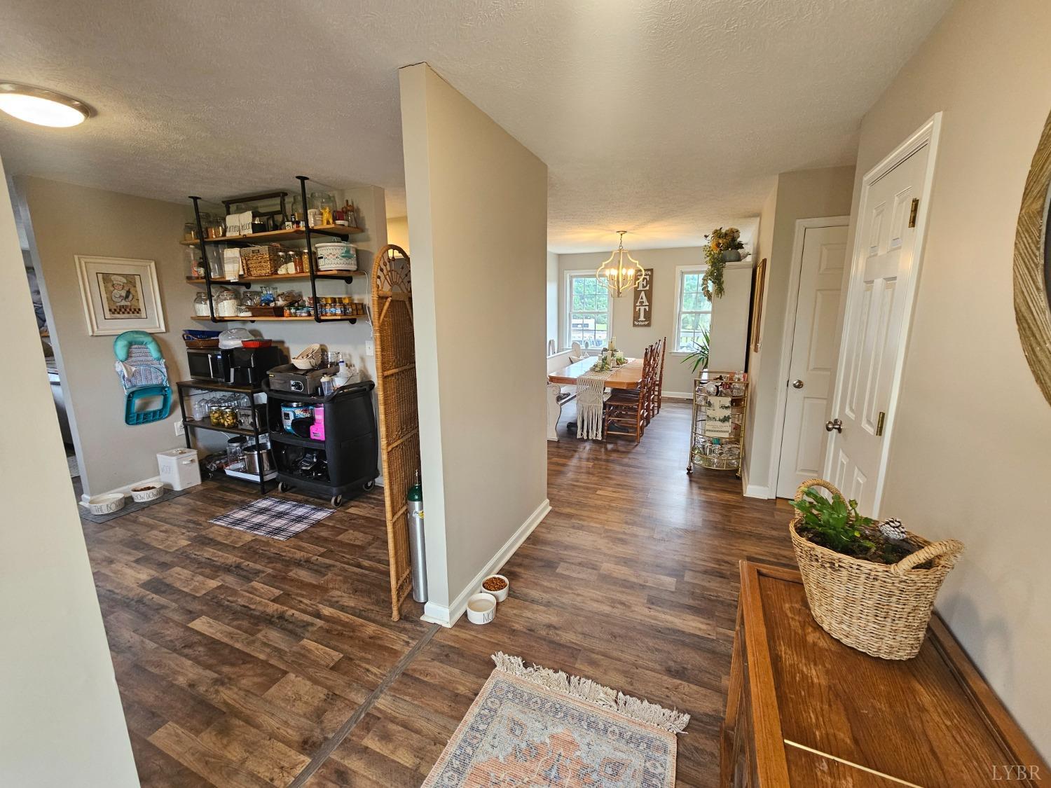 1390 Jacobs Road Hurt, VA 24563 - Photo 3 of 30 a view of a room with lots of stuff and hardwood floor